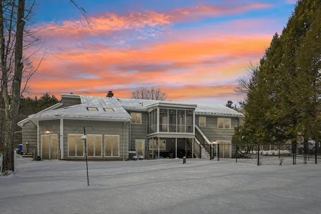 a front view of residential houses with street