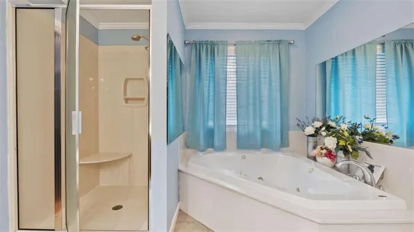 a bathroom with a sink vanity mirror and toilet