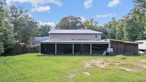 a view of a living room and bedroom