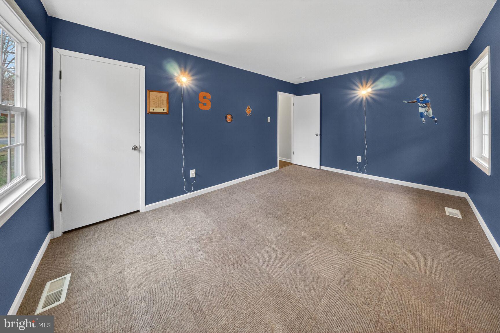 12703 Cedarbrook Lane Laurel, MD 20708 - Photo 16 of 31 a view of empty room with lamp and window
