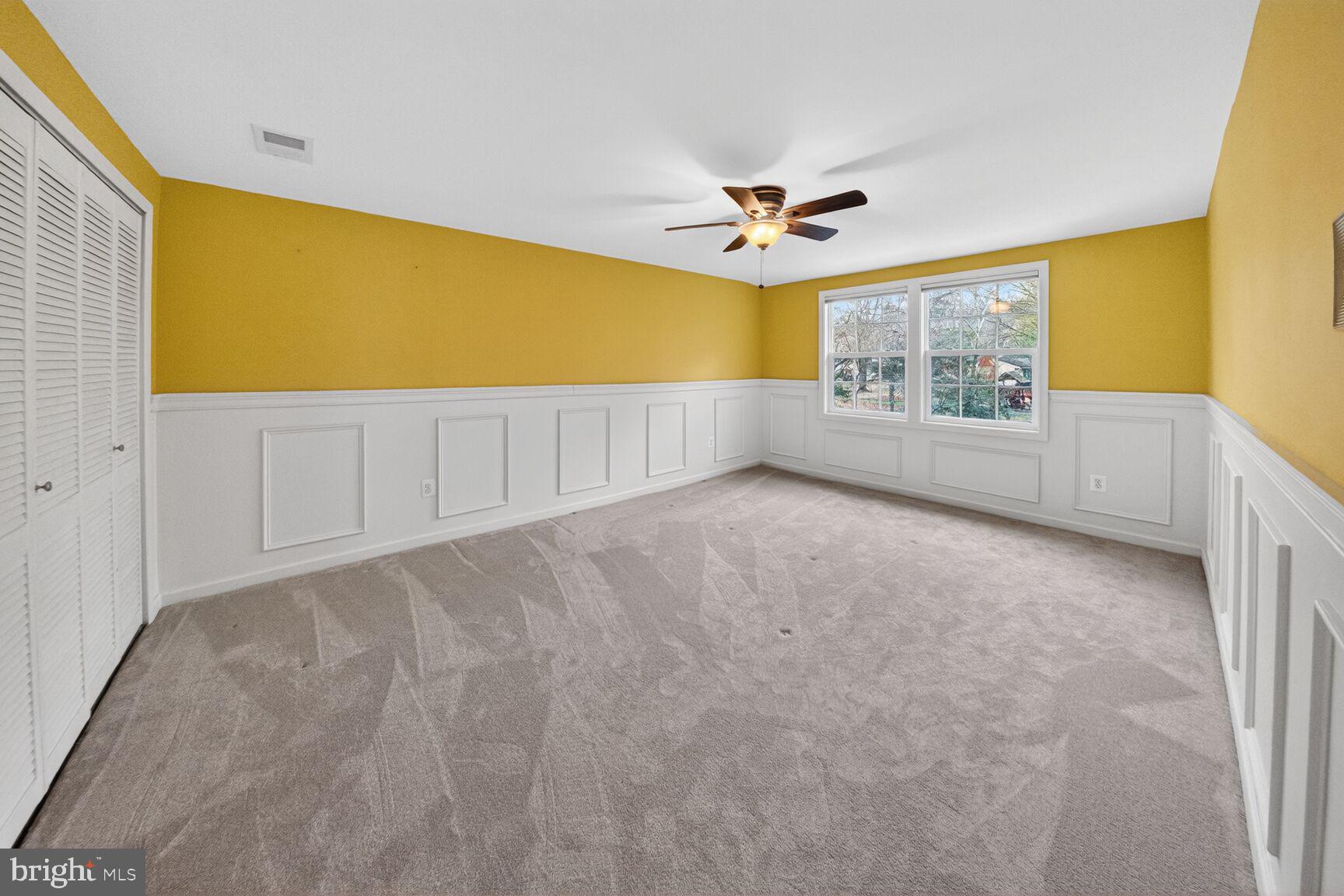 12703 Cedarbrook Lane Laurel, MD 20708 - Photo 25 of 31 a view of an empty room with a window