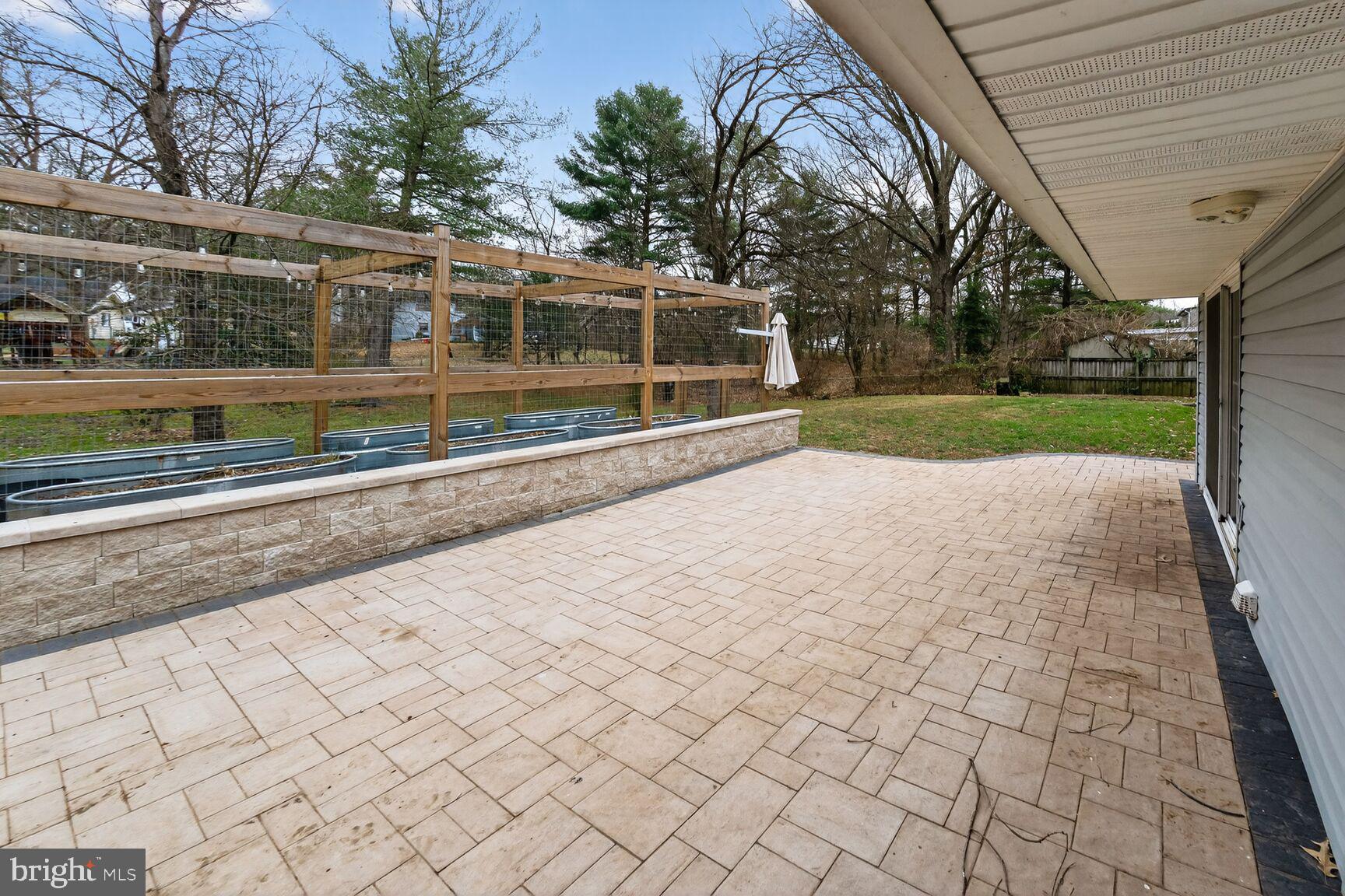 12703 Cedarbrook Lane Laurel, MD 20708 - Photo 27 of 31 a view of a house with a yard