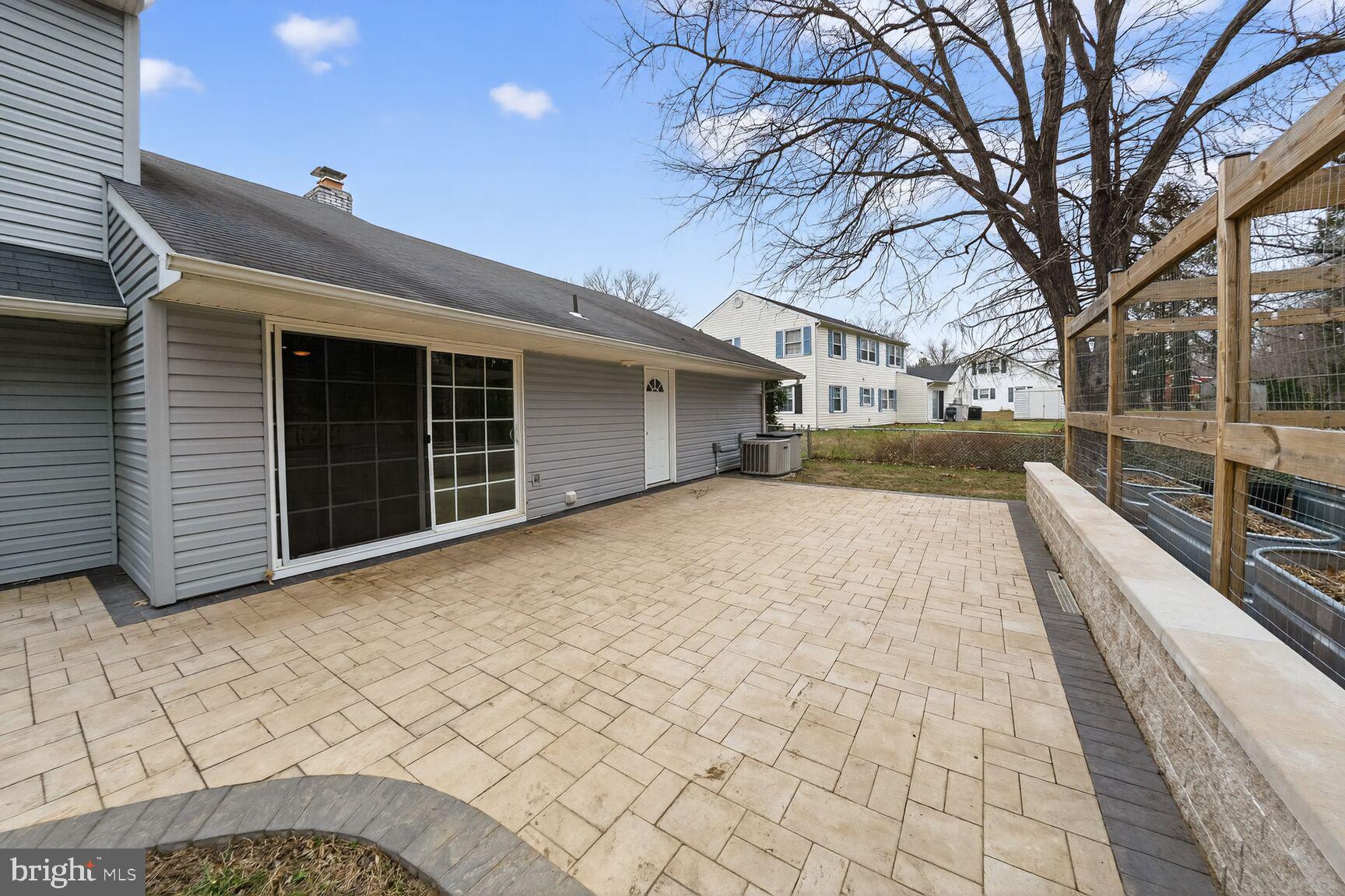 12703 Cedarbrook Lane Laurel, MD 20708 - Photo 28 of 31 a view of a house with a outdoor space