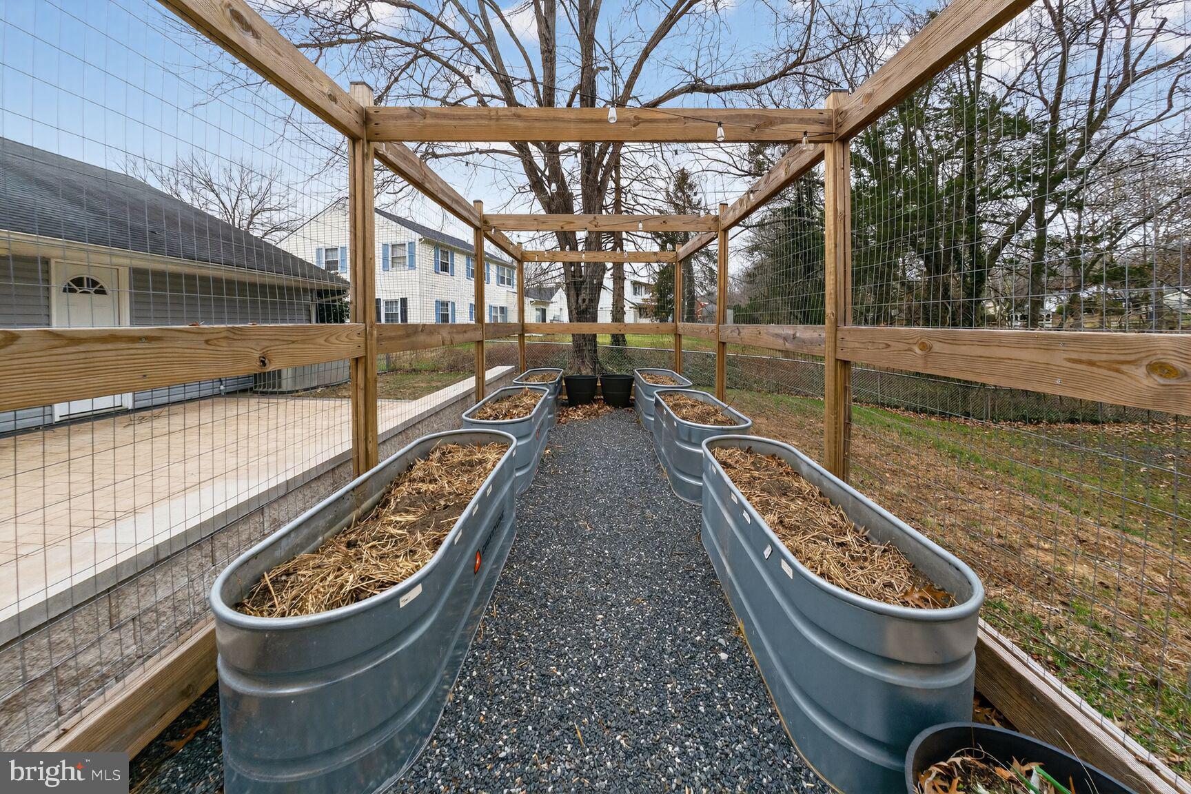 12703 Cedarbrook Lane Laurel, MD 20708 - Photo 29 of 31 a view of a balcony with chairs