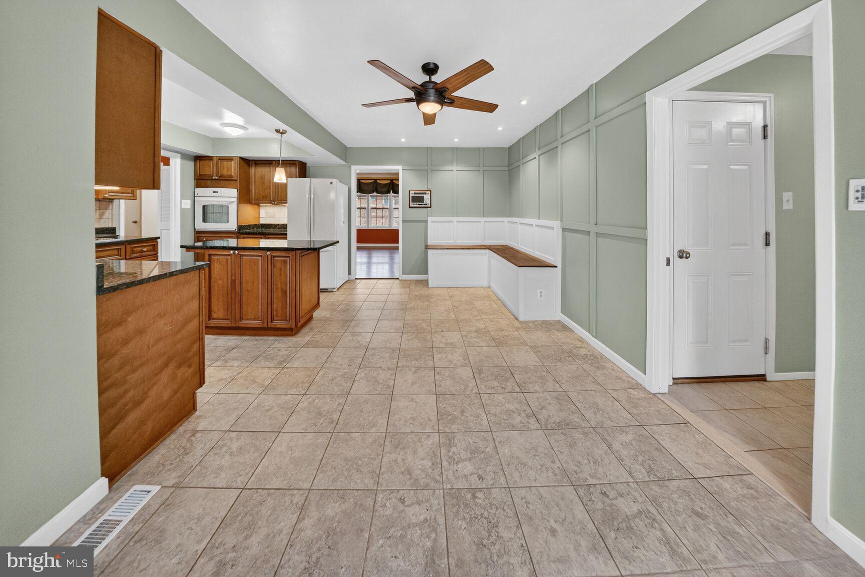 12703 Cedarbrook Lane Laurel, MD 20708 - Photo 8 of 31 a view of kitchen with cabinets