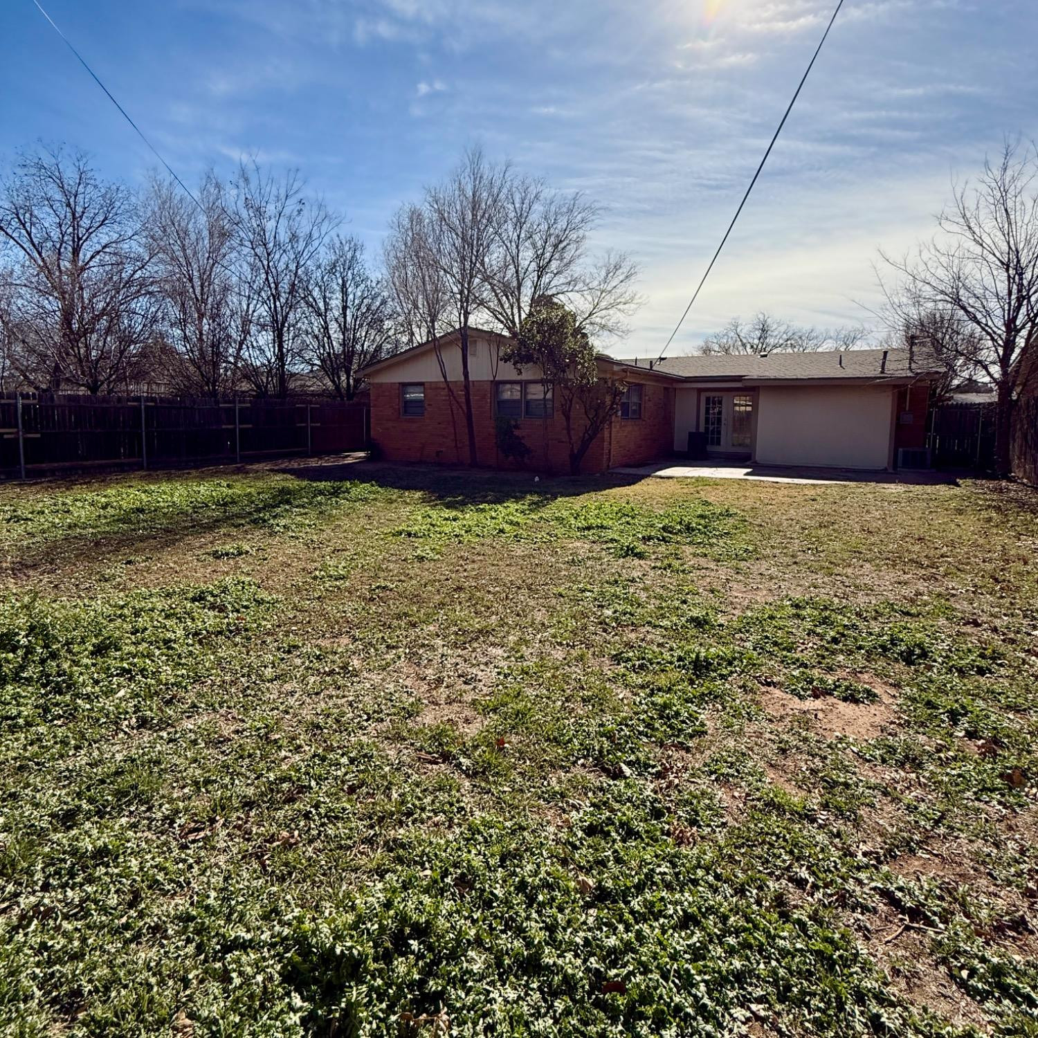 2806 54th Street Lubbock, TX 79413 - Photo 23 of 23 a view of backyard with tree