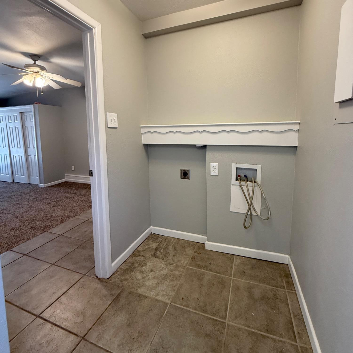 2806 54th Street Lubbock, TX 79413 - Photo 8 of 23 a view of a storage & utility room