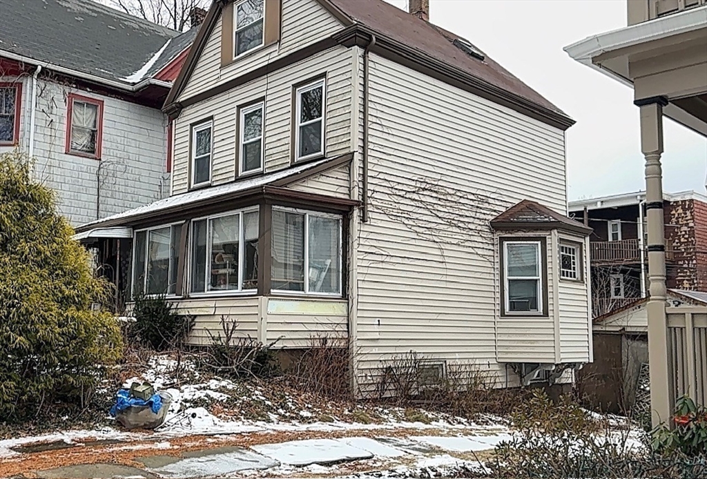 37 Longfellow Street Boston, MA 02122 - Photo 15 of 15 a front view of a house with garden