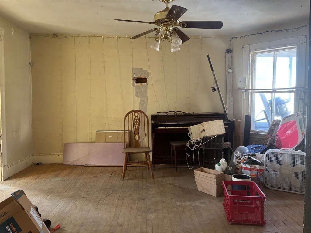 37 Longfellow Street Boston, MA 02122 - Photo 5 of 15 a room with furniture and a window