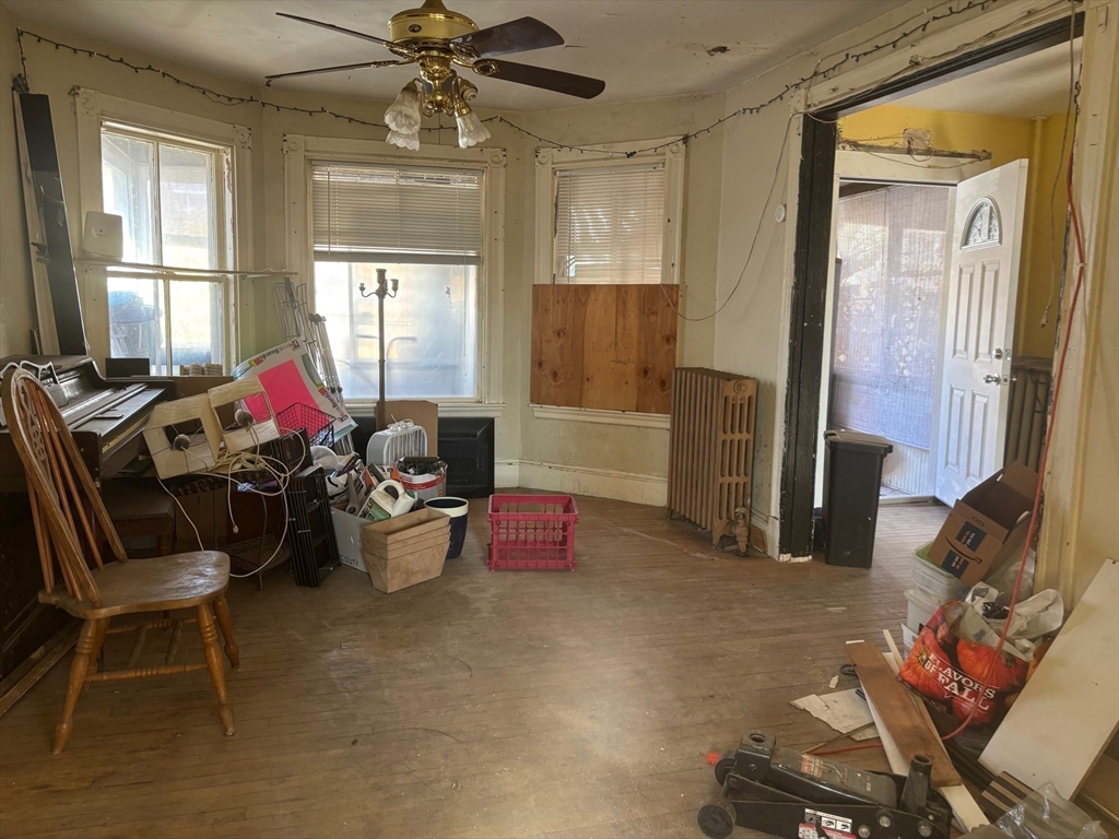 37 Longfellow Street Boston, MA 02122 - Photo 6 of 15 a living room with furniture and a window
