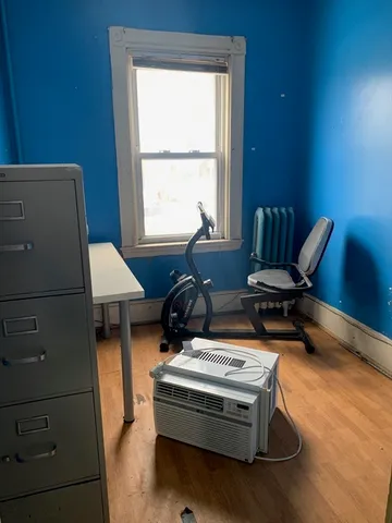 a bathroom with a shower and a sink