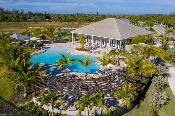 a view of a swimming pool and lounge chair