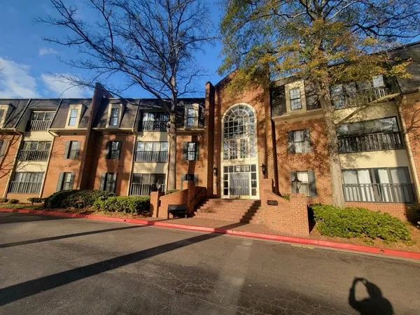 a view of a brick building with a outdoor space