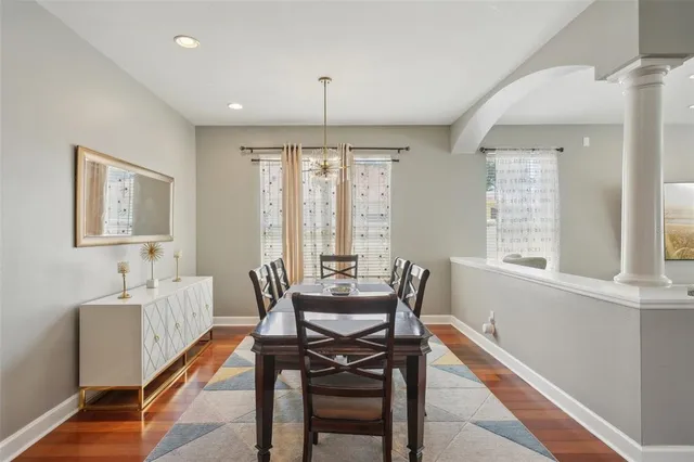 a kitchen with stainless steel appliances granite countertop a stove refrigerator and cabinets