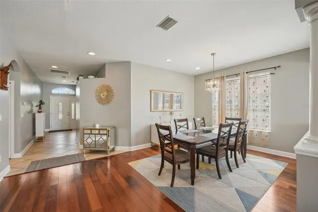 a kitchen with stainless steel appliances granite countertop a stove top oven a sink and dishwasher