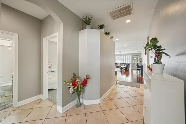 a en suite bathroom with a sink and a mirror
