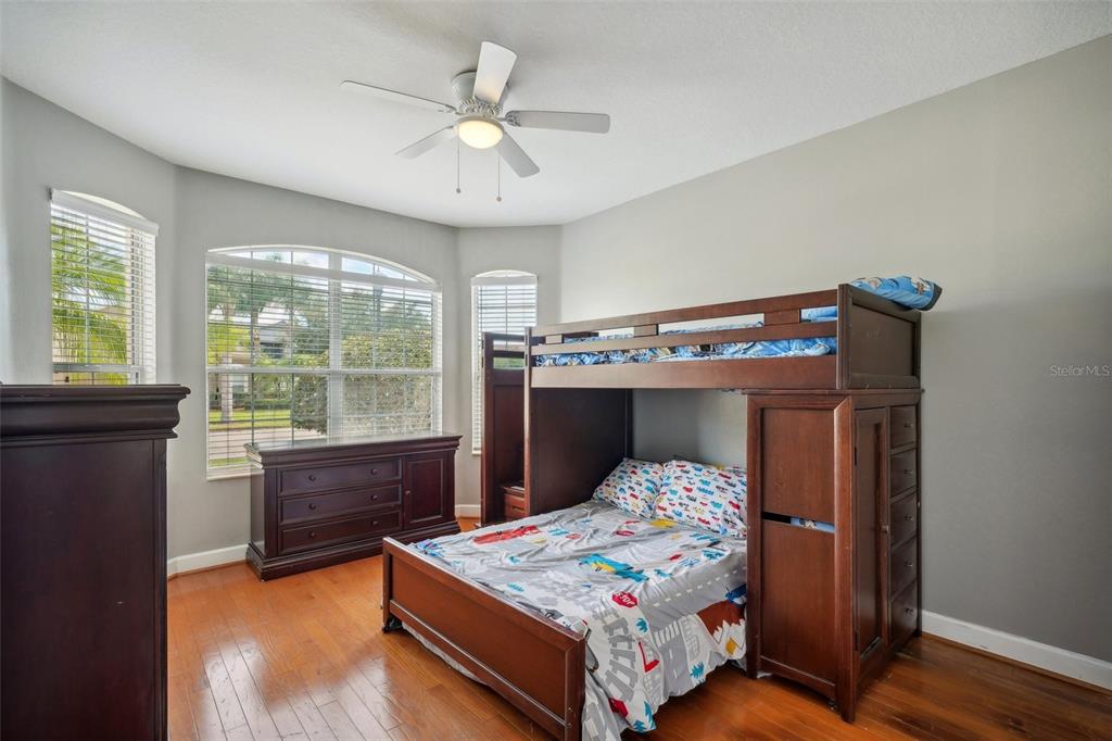 16751 Taylow Way Odessa, FL 33556 - Photo 26 of 54 a bedroom with a bed and a window