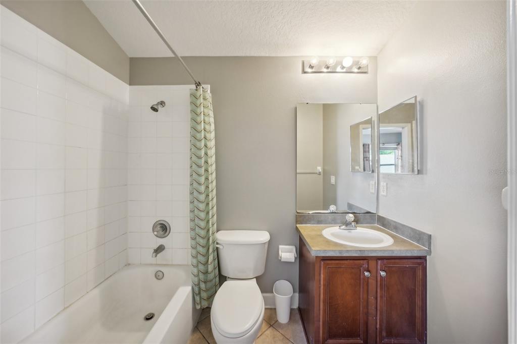 16751 Taylow Way Odessa, FL 33556 - Photo 44 of 54 a bathroom with a sink a toilet and shower