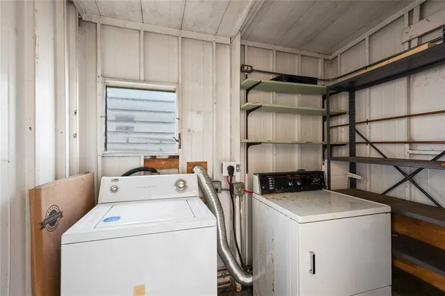 a utility room with dryer and washer