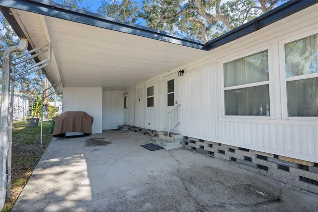 a view of a backyard of a house
