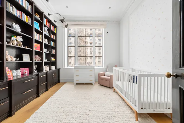 a room with a bed and a window