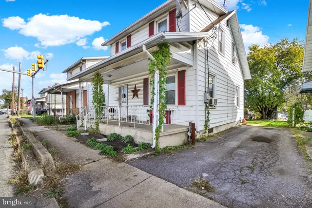 a backyard of a house with seating space