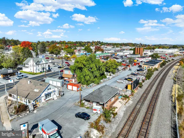 a view of a car park in front of house