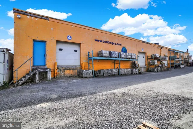 a view of a house with sitting area and furniture