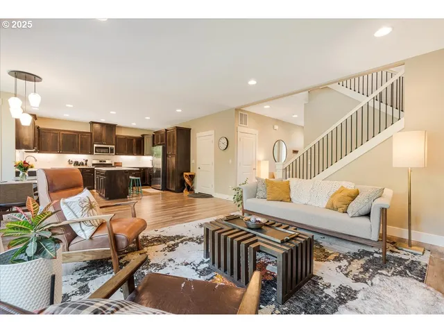 a living room with furniture and a table