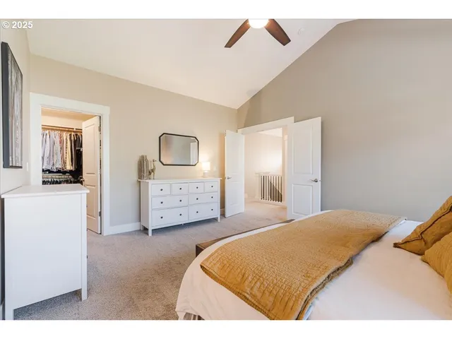 a bedroom with a bed and a view of bathroom