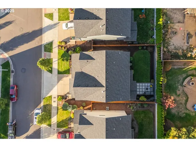 a bird view of a house with a garden