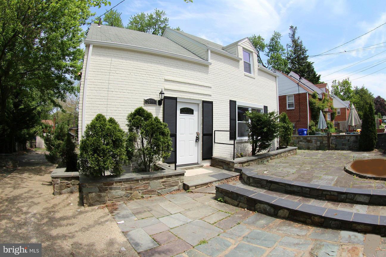 2611 Harris Avenue Silver Spring, MD 20902 - Photo 2 of 30 a view of a house with backyard and sitting area
