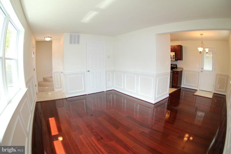 2611 Harris Avenue Silver Spring, MD 20902 - Photo 17 of 30 wooden floor in an empty room with a window