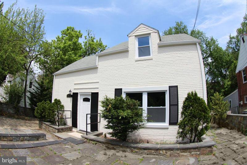 2611 Harris Avenue Silver Spring, MD 20902 - Photo 3 of 30 a front view of a house with a yard