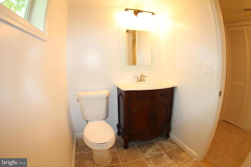2611 Harris Avenue Silver Spring, MD 20902 - Photo 25 of 30 a bathroom with a toilet and a sink