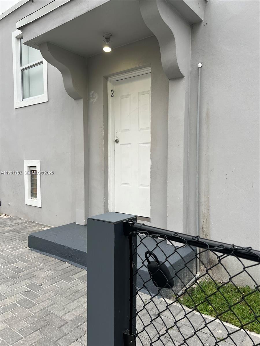 1810 Northwest 34th Street, Unit 2 Miami, FL 33142 - Photo 11 of 11 a view of a black and white wall