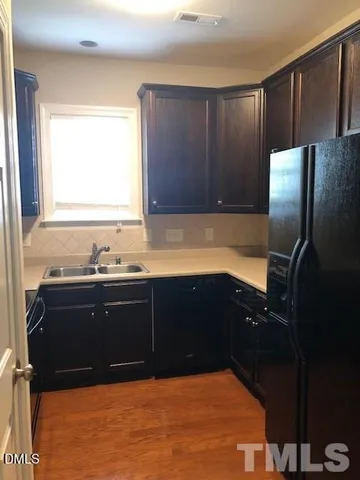 a bathroom with a bathtub and a sink