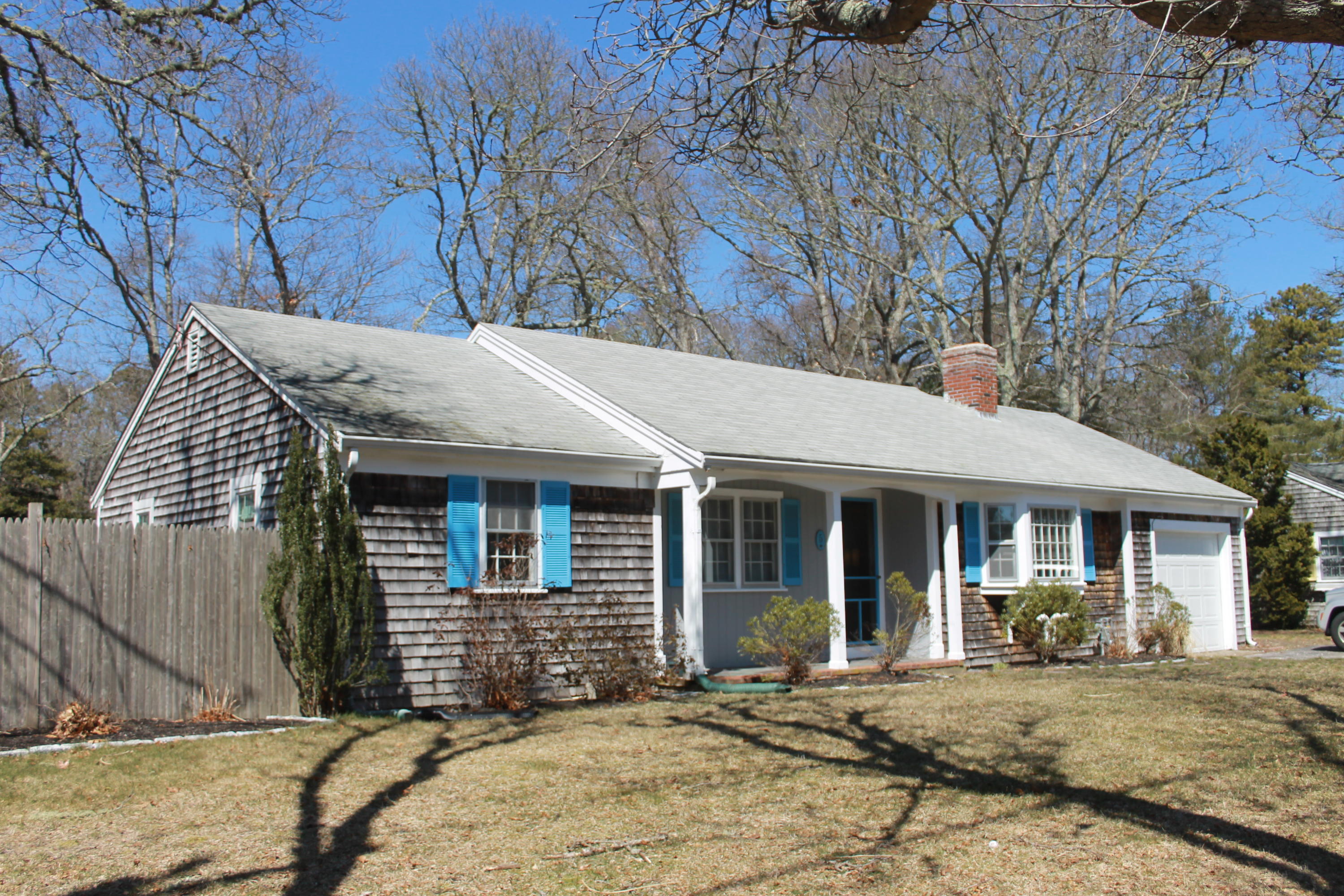 5 Juniper Road Centerville, MA 02632 - Photo 1 of 26 a front view of a house with garden