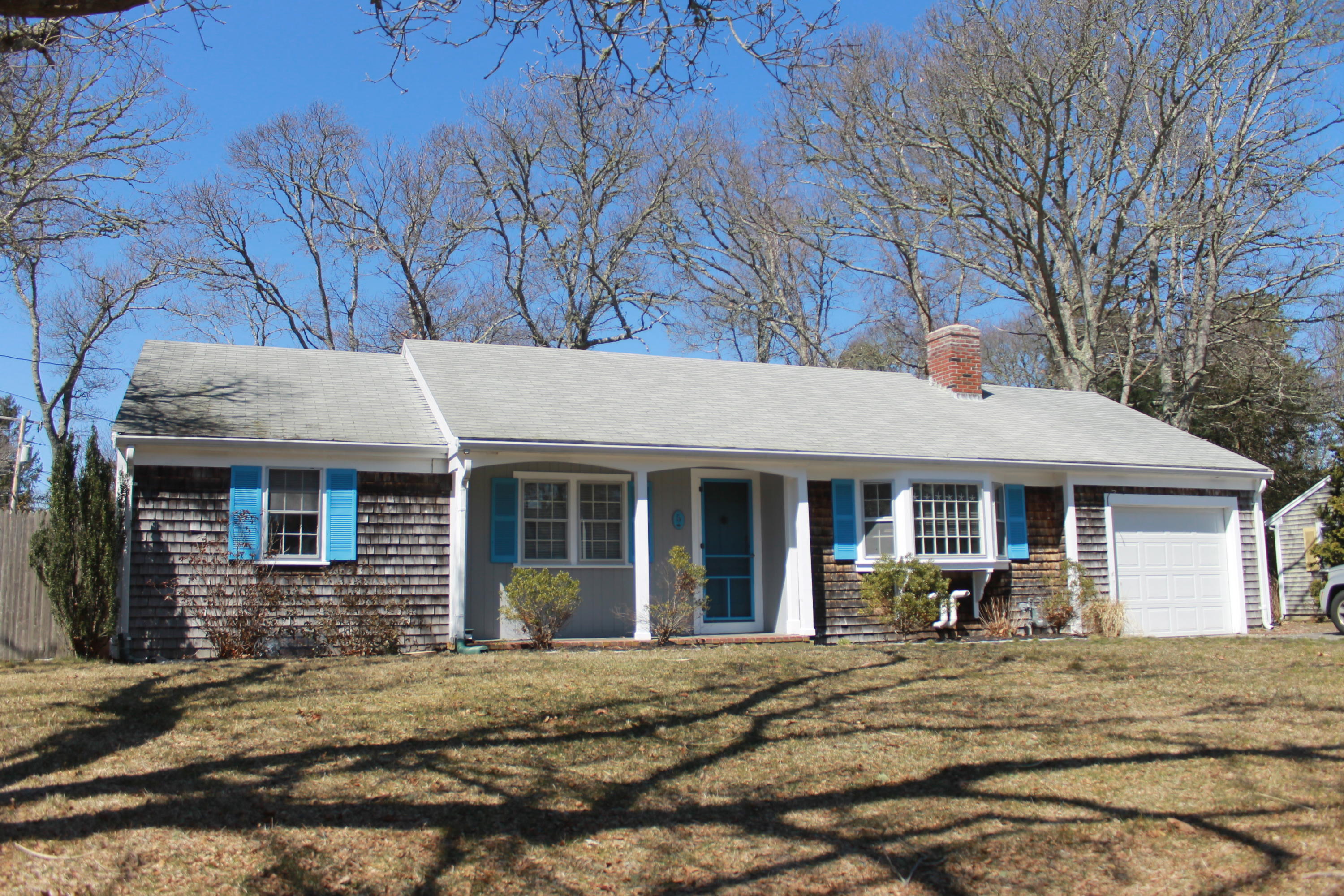 5 Juniper Road Centerville, MA 02632 - Photo 25 of 26 a view of a house with a yard and large tree