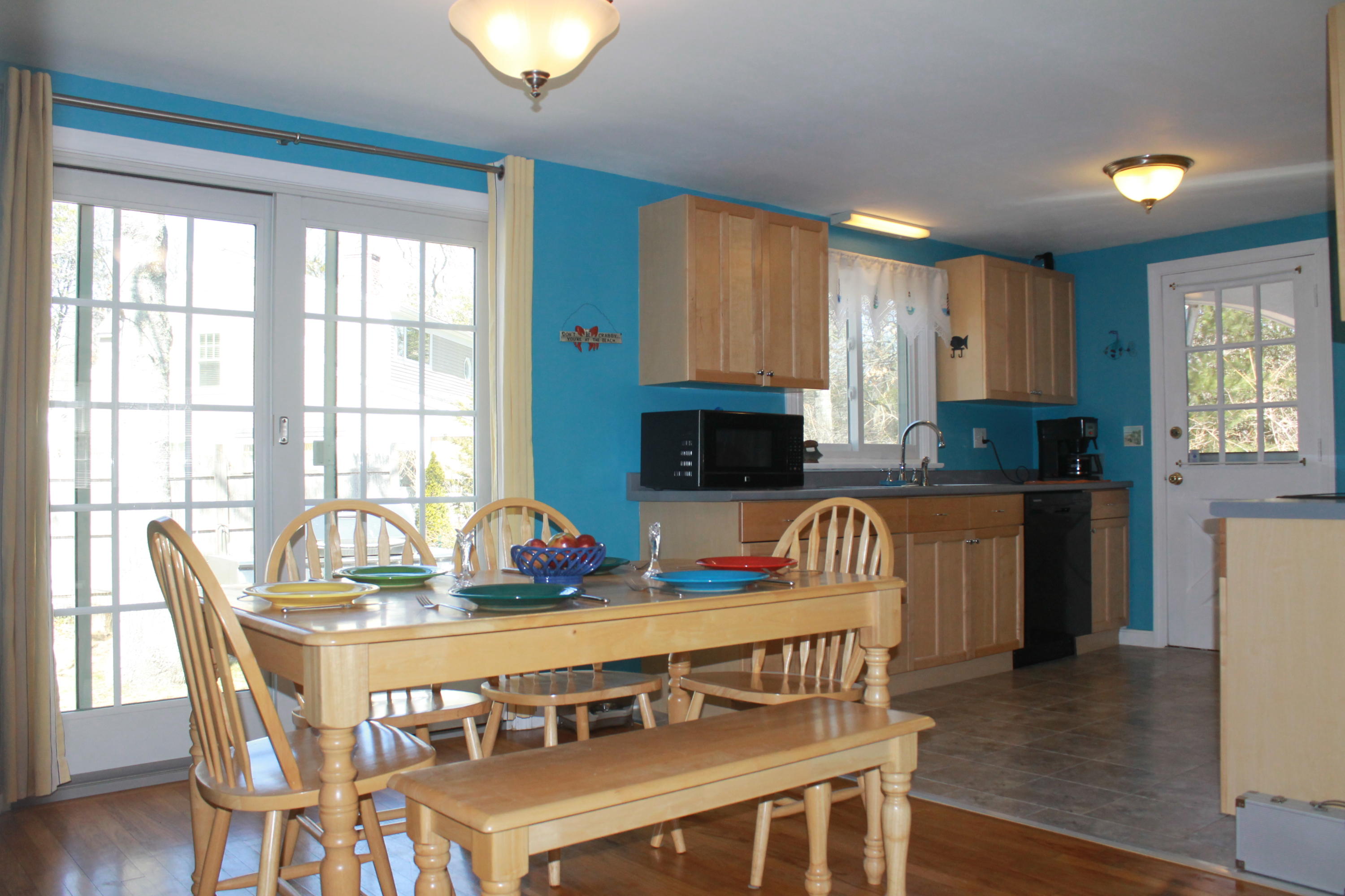 5 Juniper Road Centerville, MA 02632 - Photo 6 of 26 a view of a dining room with furniture and window