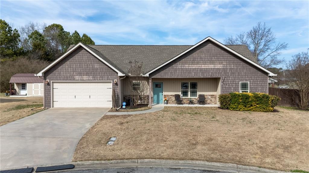 109 Gilmore Circle Calhoun, GA 30701 - Photo 1 of 1 a view of house and yard with green space