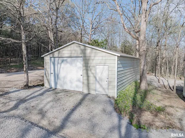 a house with trees in front of it