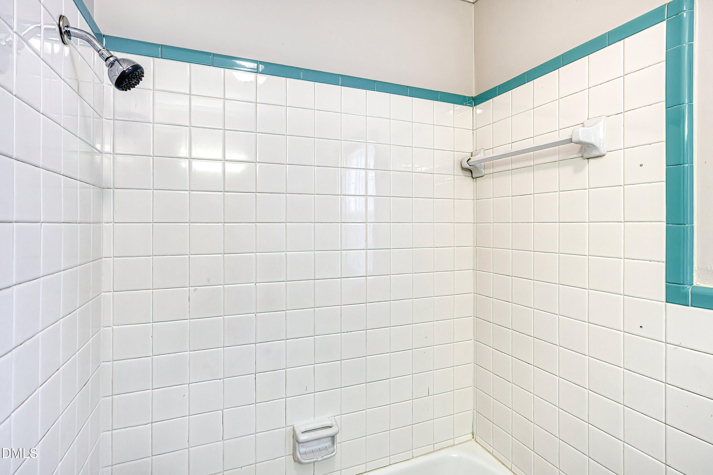 629 East Main Street Clayton, NC 27520 - Photo 23 of 39 a bathroom with a shower
