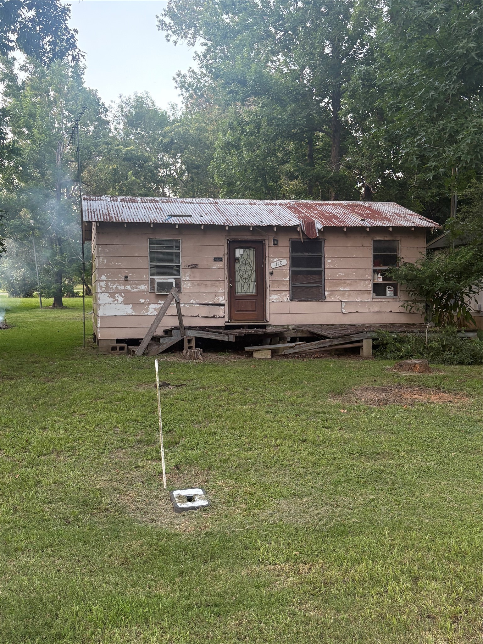 170 Wendy Lane Trinity, TX 75862 - Photo 3 of 6 Tree fell, has some damage but can be repaired.