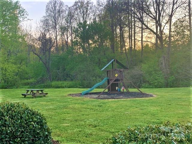 0 Creekside Circle, Unit 129 Rutherfordton, NC 28139 - Photo 3 of 5 a view of outdoor space with playground and green space