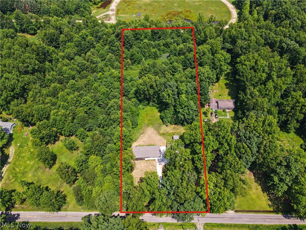 7583 Yale Road Atwater, OH 44201 - Photo 3 of 41 3.38 acres of land and a 4 car detached garage with electric, door openers, and extra storage space.