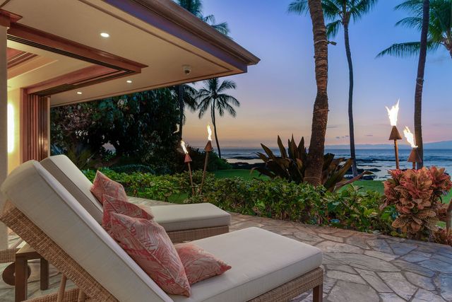 a view of yard with patio