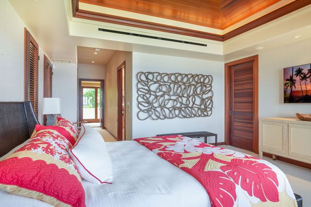 a bathroom with a granite countertop sink mirror and window