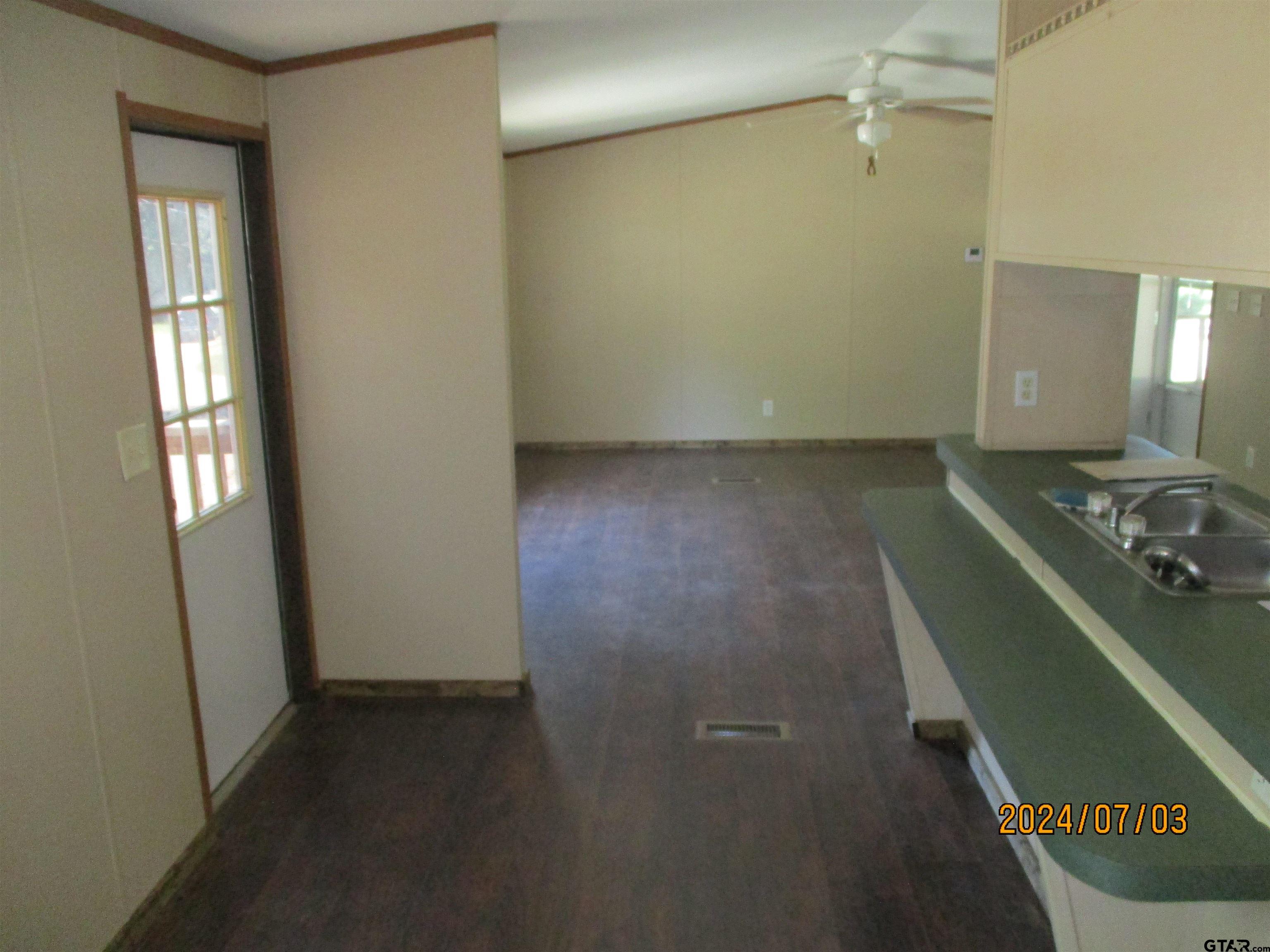 105 Sioux Lane Longview, TX 75603 - Photo 11 of 22 an empty room with windows