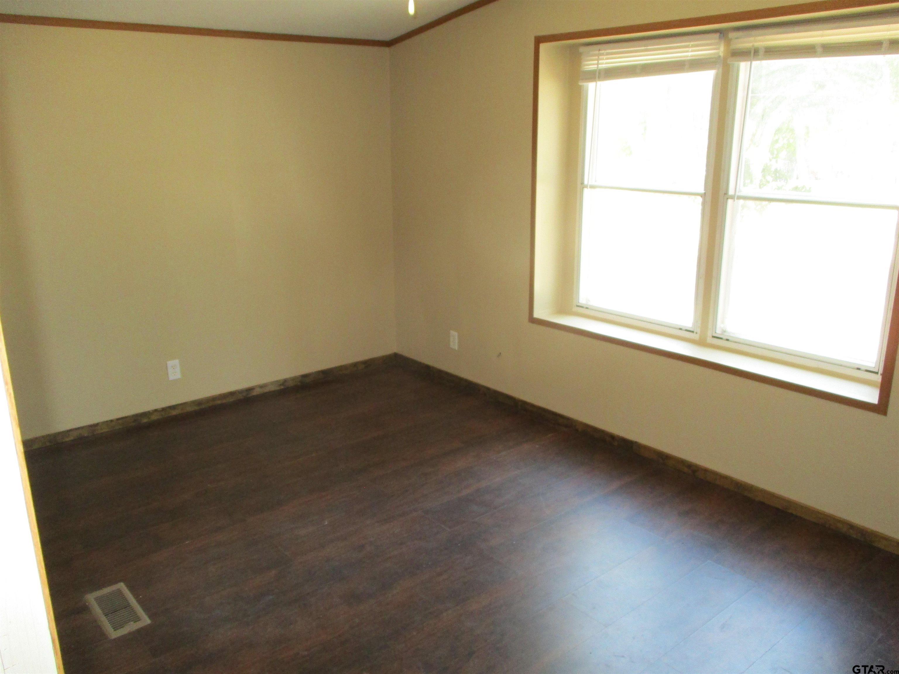 105 Sioux Lane Longview, TX 75603 - Photo 20 of 22 an empty room with a window